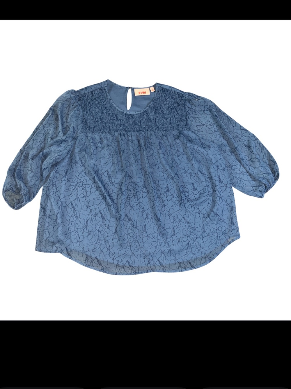 A blue Evri floral patterned blouse